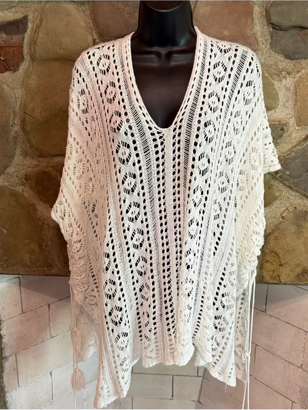 Cream Open-Knit Crochet Poncho with V-Neck and Tassel Trim
